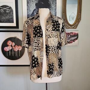 Woman's Alfred Dunner patchwork animal print button down shirt.